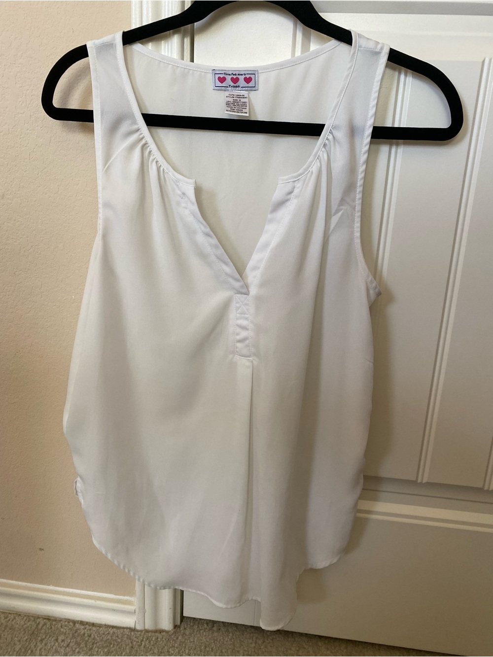 White Sleeveless V-Neck Blouse